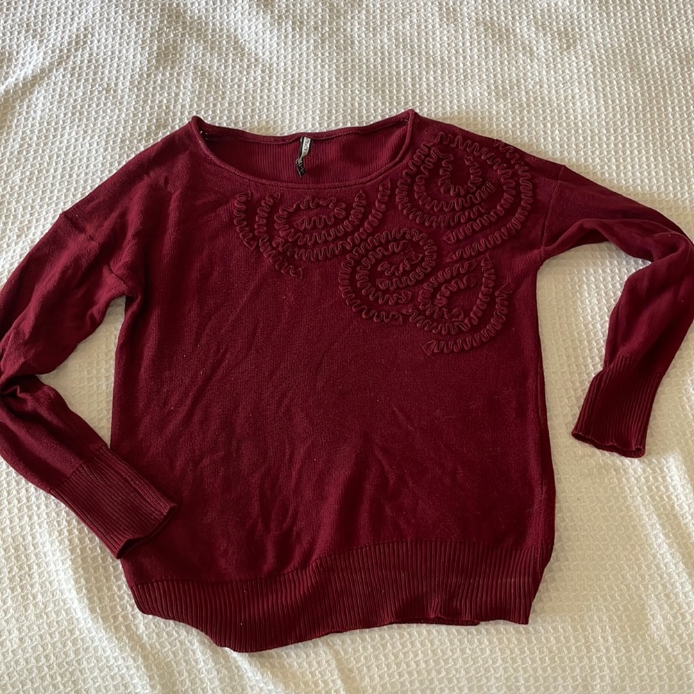 Red scoop neck sweater